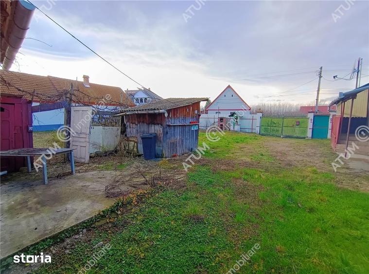 Casă cu 4 camere decomandat cu Teren 1650 Mp în Porumbacu de Jos