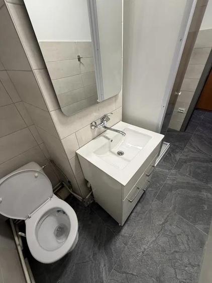 Apartament cu 2 camere semidecomandat, mobilat în Podu Roș
