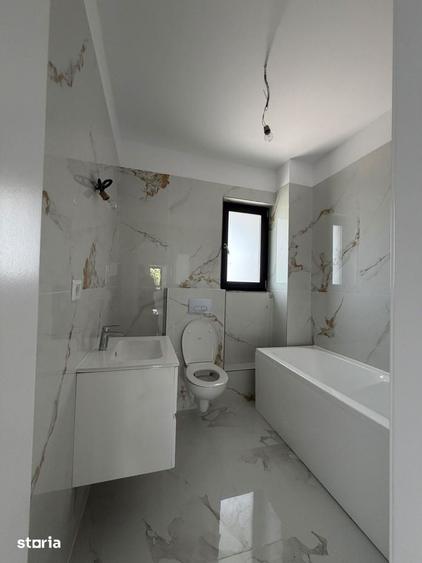 Casă cu 4 camere cu Teren 350 Mp în Central