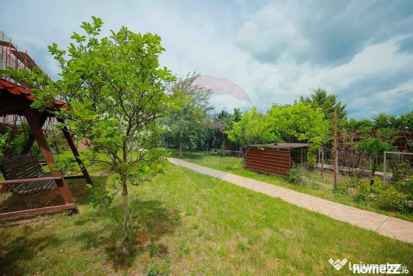 Casă cu 5 camere cu Teren 1000 Mp în Sânmartin