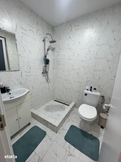 Casă cu 4 camere cu Teren 450 Mp în Tunari