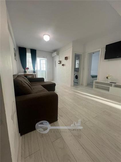 Apartament cu 2 camere semidecomandat, mobilat în Cug — fotografia 1