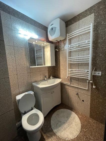 Apartament cu 2 camere semidecomandat, mobilat în Central
