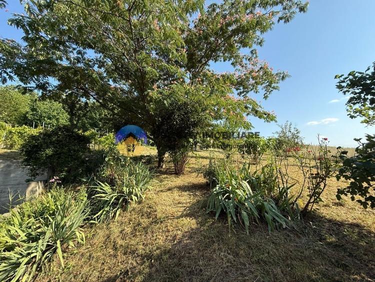 Casă individuală cu 5 camere cu Teren 2000 Mp în Gârcina