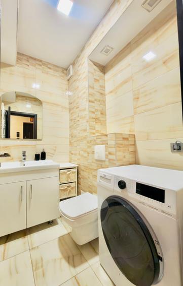 Apartament cu 3 camere decomandat în Tractorul