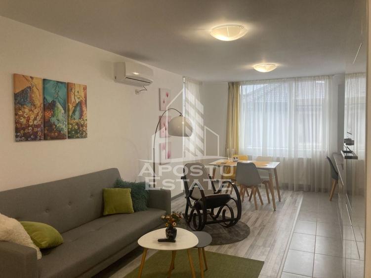 Apartament cu 2 camere semidecomandat, mobilat în Central