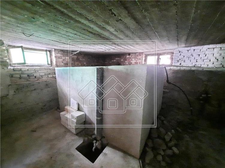 Casă individuală cu 4 camere cu Teren 1177 Mp în Cisnădioara