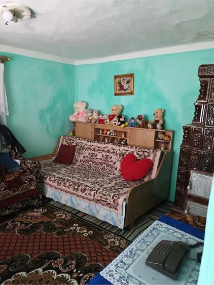 Casă cu 2 camere cu Teren 500 Mp în Cârlomănești