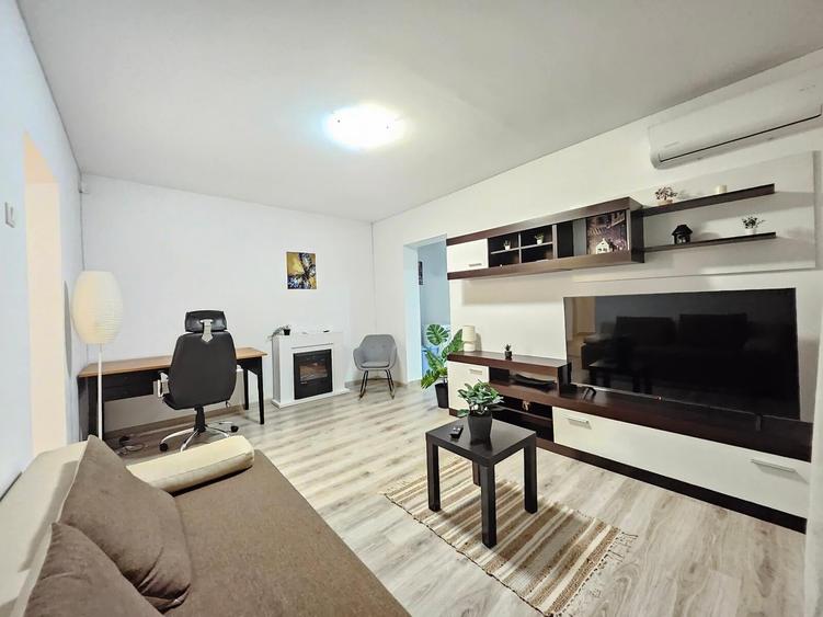 Apartament cu 2 camere semidecomandat, mobilat în Central