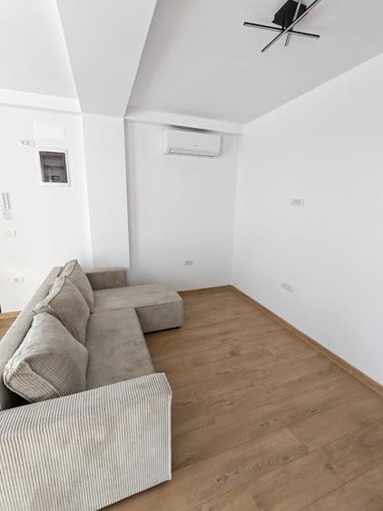 Apartament cu 2 camere semidecomandat, mobilat în Moșnița Nouă