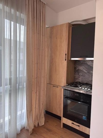 Apartament cu 2 camere semidecomandat, mobilat în Central
