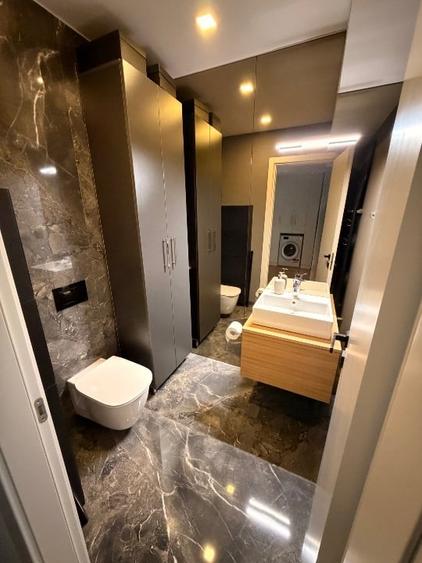 Apartament cu 2 camere semidecomandat, mobilat în Central
