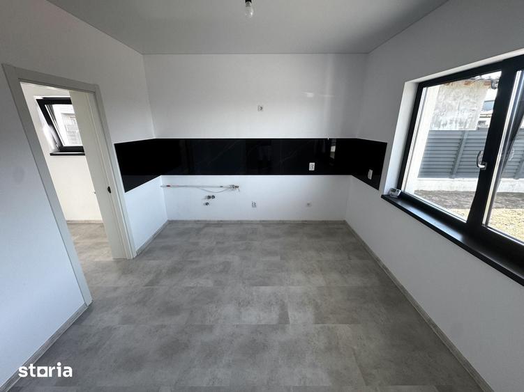 Casă cu 4 camere cu Teren 510 Mp în Holboca