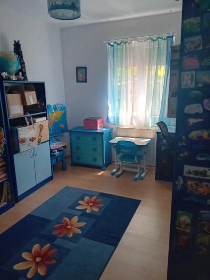 Casă cu Teren 500 Mp în Roșu