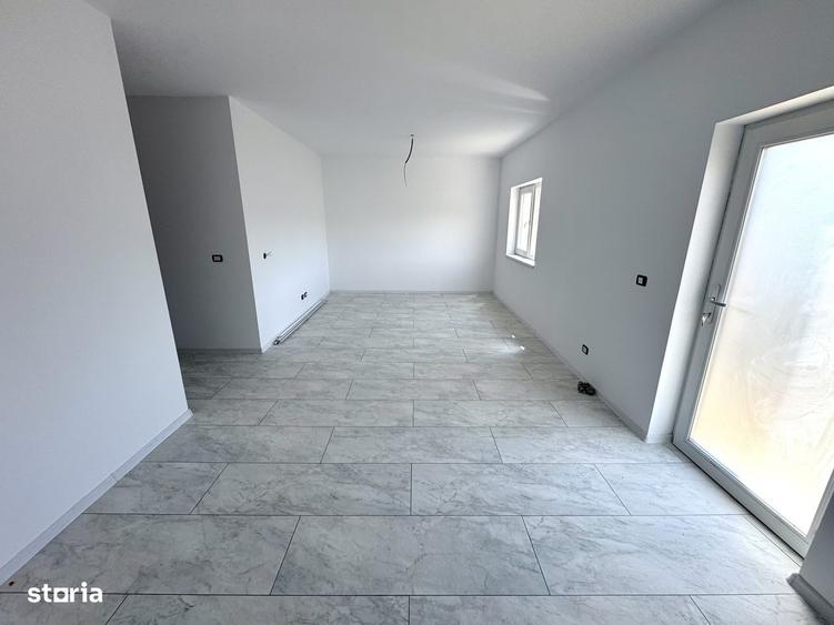 Casă cu 4 camere în Tomești