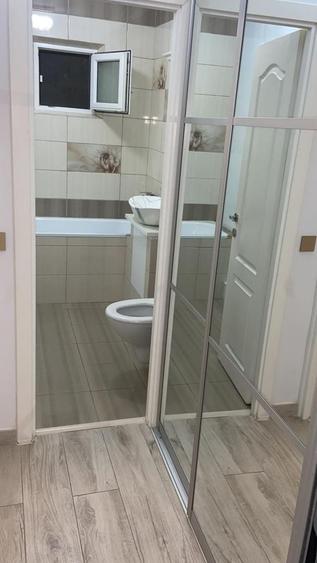 Apartament cu 4 camere decomandat în Micro 14