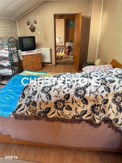 Casă cu 6 camere cu Teren 1000 Mp în Ciolpani