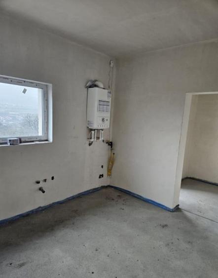 Casă cu 4 camere cu Teren 332 Mp în Chinteni