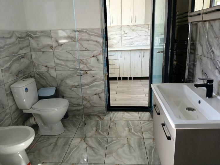 Casă individuală cu 2 camere cu Teren 1568 Mp în Roata de Jos