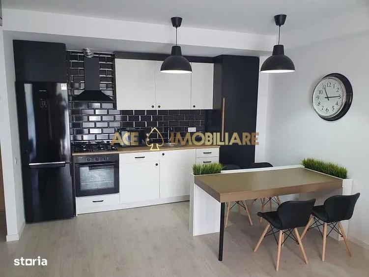 Apartament cu 2 camere semidecomandat, mobilat în Costin Georgian