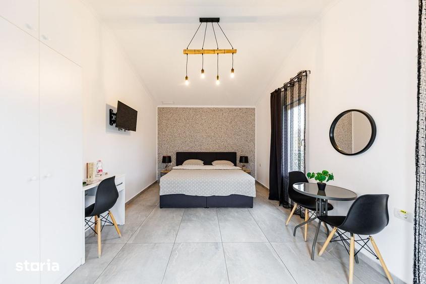 Casă cu Teren 1670 Mp în Giarmata