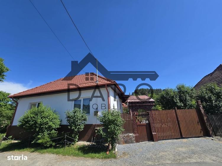 Casa in Livezeni , 140 mp utili , in centrul localitatii . - 10