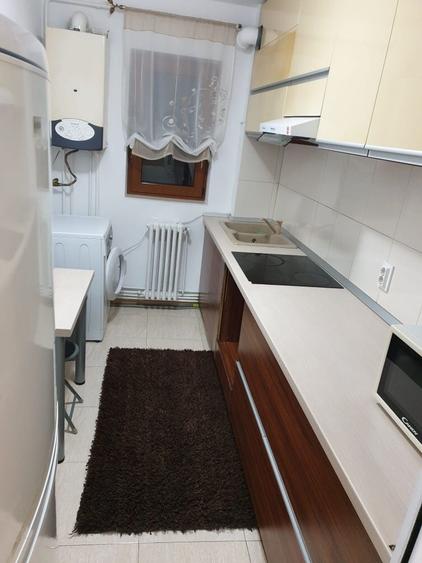 Apartament cu 2 camere semidecomandat în Podu Roș