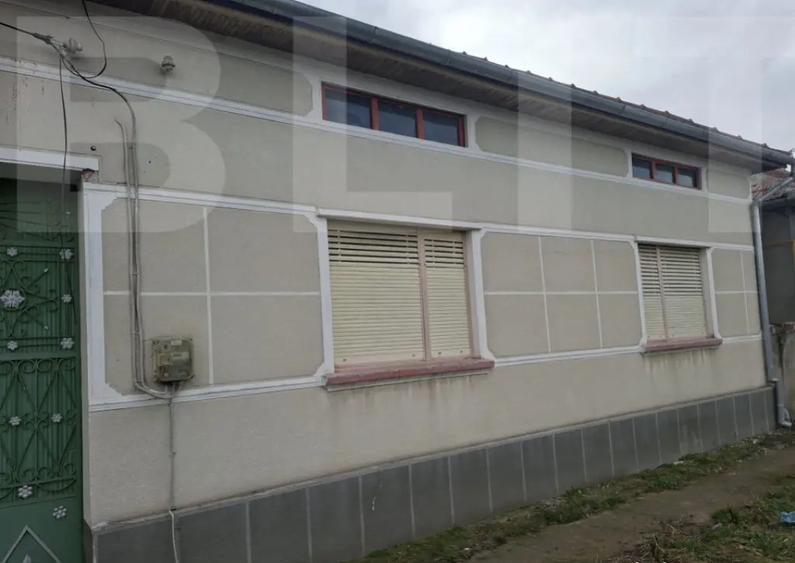 Casă cu 4 camere cu Teren 1000 Mp în Central