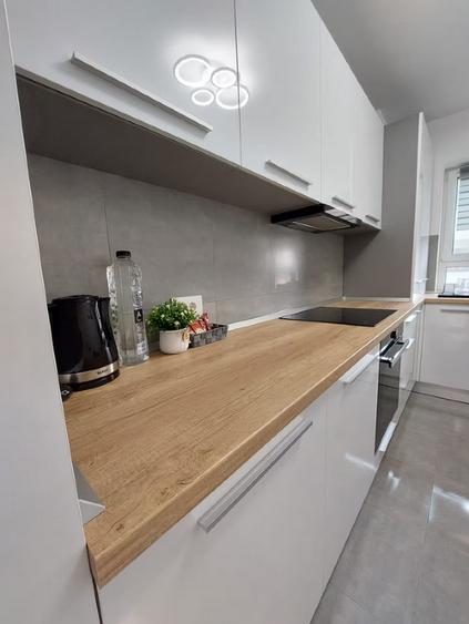 Apartament cu 2 camere semidecomandat, mobilat în Tractorul