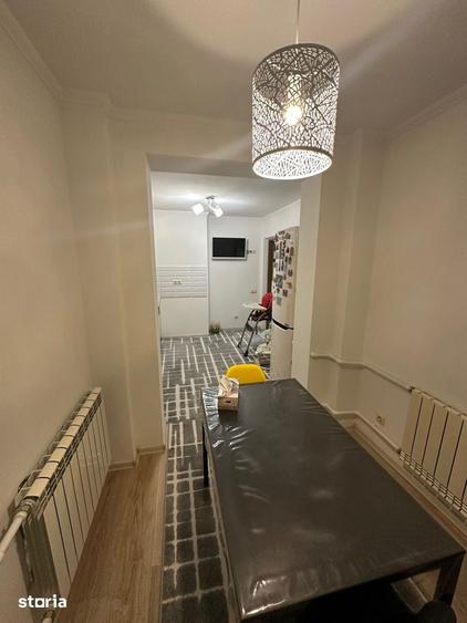 Apartament cu 3 camere în Romană