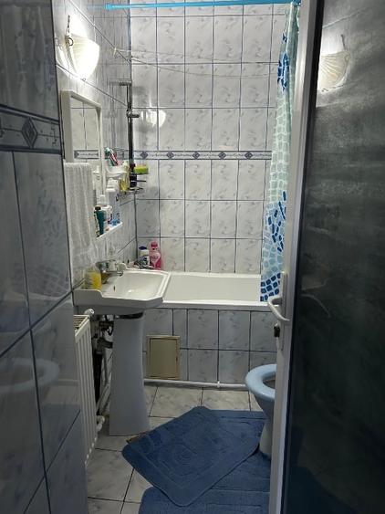 Casă individuală cu 4 camere cu Canalizare în Sud