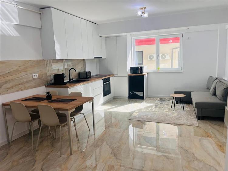 Apartament cu 2 camere semidecomandat, mobilat în Calea București