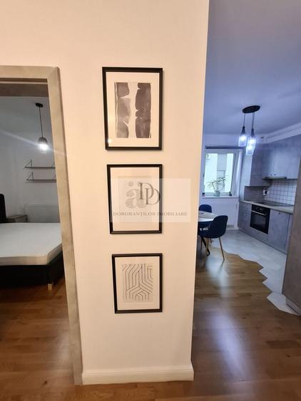 Apartament cu 2 camere semidecomandat, mobilat în Borhanci