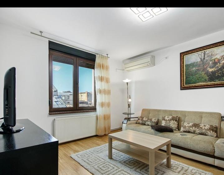 Apartament cu 2 camere semidecomandat, mobilat în P-ța Universității