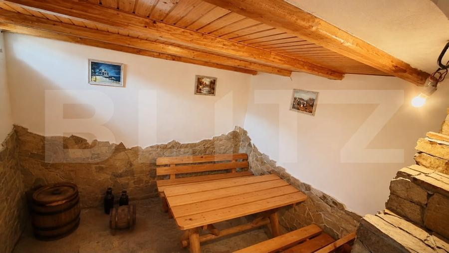 Casă individuală cu 6 camere cu Teren 2000 Mp în Exterior Est