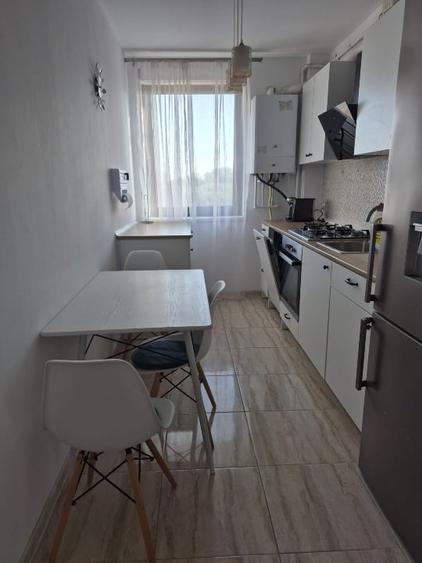 Apartament cu 2 camere semidecomandat, mobilat în Giroc