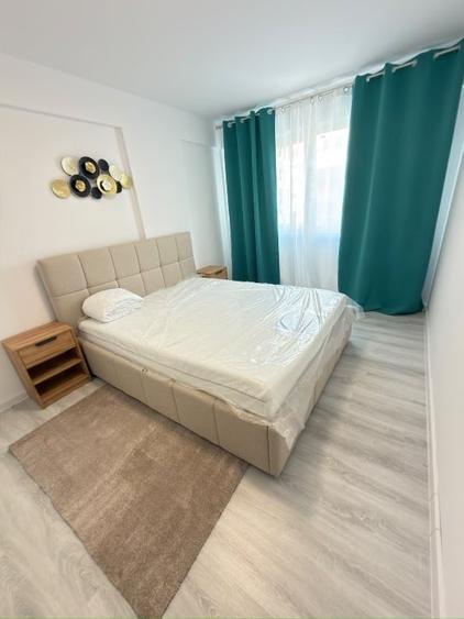 Apartament cu 2 camere semidecomandat, mobilat în Central