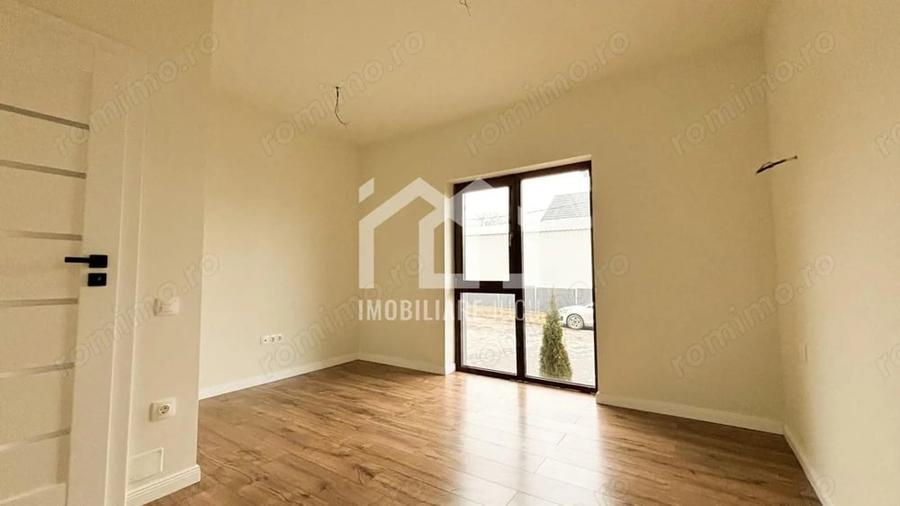 Apartament cu 3 camere semidecomandat în Jucu