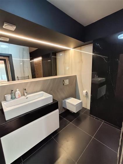 Apartament cu 2 camere semidecomandat, mobilat în Central