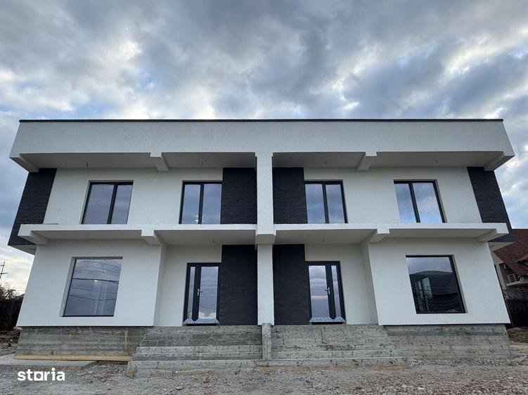Casă cu 4 camere în Bascov