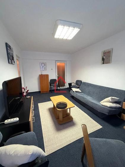 Apartament cu 3 camere decomandat în Filiași