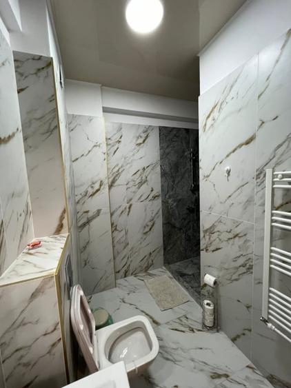 Apartament cu 3 camere, mobilat în Central
