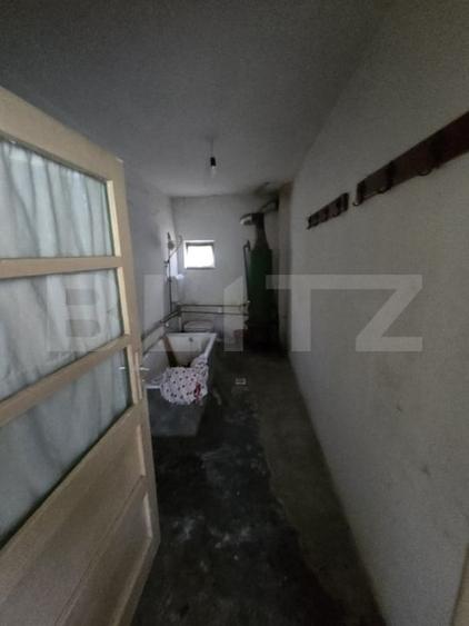 Casă individuală cu 3 camere cu Canalizare în Titu