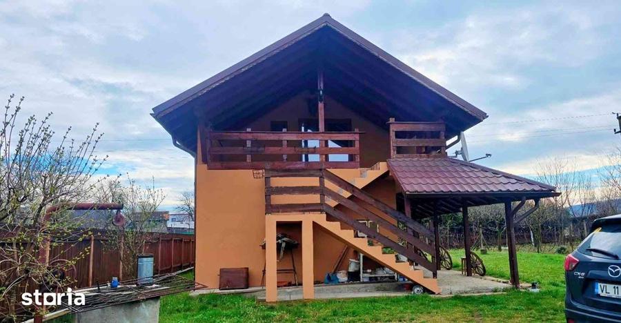 Casă cu 4 camere cu Teren 1701 Mp în Racovița