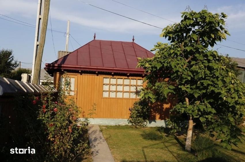 Casă cu 4 camere cu Teren 1400 Mp în Răucești