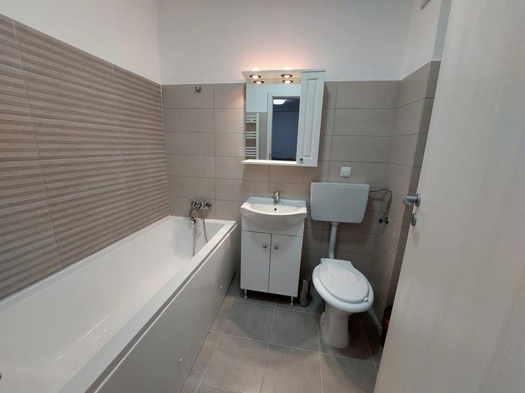 Apartament cu 2 camere semidecomandat în Runcu