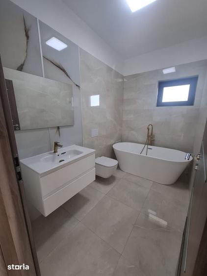 Casă cu 5 camere cu Teren 330 Mp în Tunari