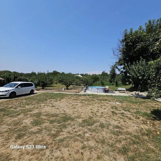 Casă cu 10 camere cu Teren 2500 Mp în Curcani
