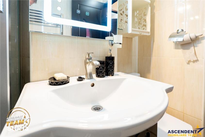 Apartament cu 2 camere semidecomandat, mobilat în Central