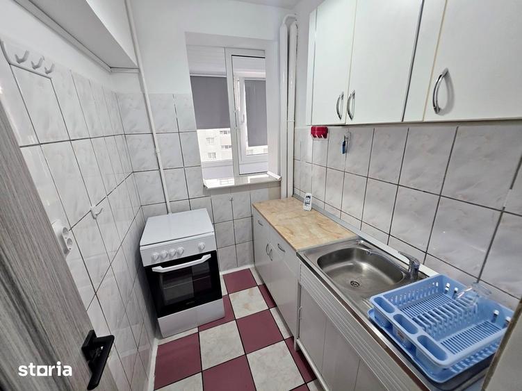 Garsonieră decomandată în Titan